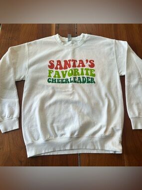 Gildan Santa’s Favorite Cheerleader white sweatshirt size m